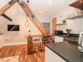 Fridge, electric kettle, toaster, cookware/dishes/utensils