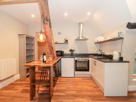 Fridge, electric kettle, toaster, cookware/dishes/utensils