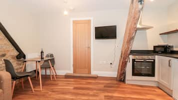 Fridge, electric kettle, toaster, cookware/dishes/utensils