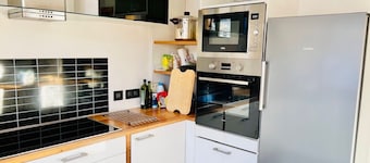 Joli triplex avec jardin et vue