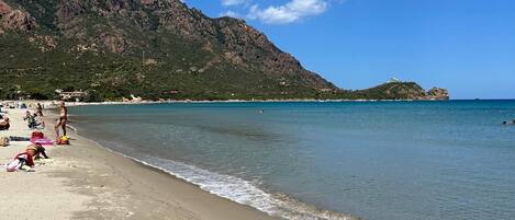 On the beach, sun loungers