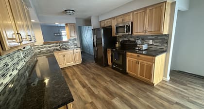 NEW Three bedroom ranch style pet friendly home with a patio & theatre room!