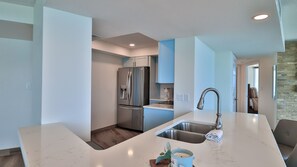 Fridge, microwave, oven, stovetop - PARADISE FOUND Luxury 2/2 Oceanfront Condo-Lovely Decor, Best Ocean Views - Peck11SE (Daytona Beach Shores)