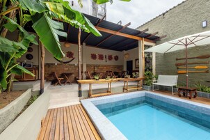 Outdoor pool, pool umbrellas, pool loungers