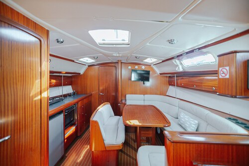 Sail into Serenity: Discover Albufeira's Charm aboard Our Elegant Sailboat 