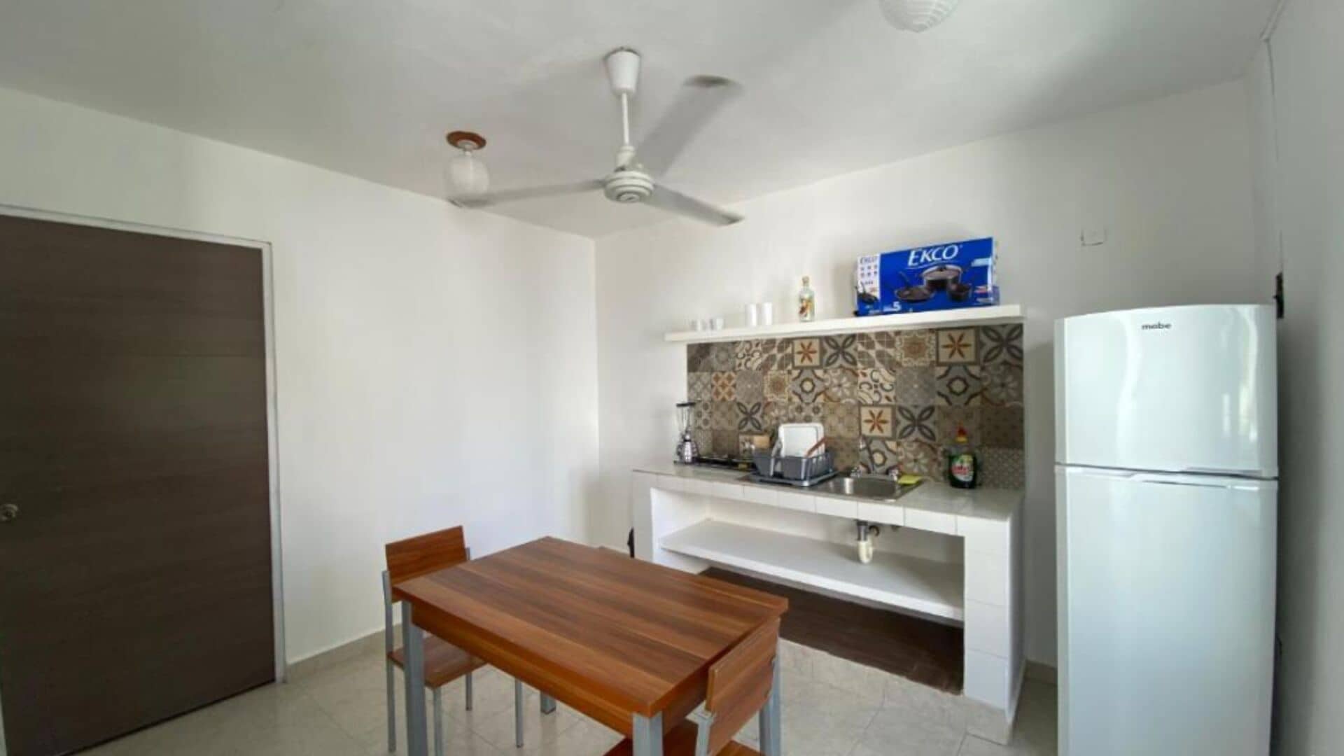 Full-size fridge, microwave, blender, cookware/dishes/utensils