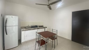 Full-sized fridge, microwave, blender, cookware/dishes/utensils