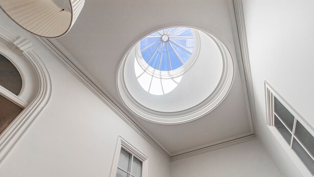 A room with a skylight, a window, and a door. - Music Shell by LovelyStay (Porto)