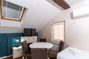 Estudio familiar | Minibar, wifi gratis y ropa de cama 