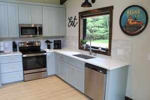 Fridge, microwave, oven, stovetop - Brand New Secluded Cabins in Arbor Vitae, WI (arbor vitae)