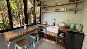 Fridge, microwave, stovetop, coffee/tea maker