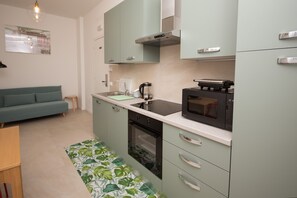 Leilighet – business, 1 soverom, ikke-røyk, kjøkken | Eget kjøkken | Kjøleskap, mikrobølgeovn, ovn og kokeplater