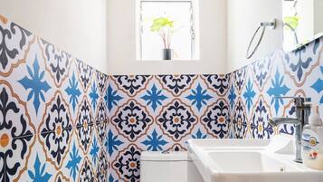 Hair dryer, towels, soap, toilet paper