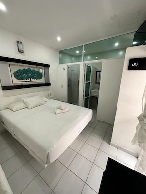 Quarto família | Camas com colchões pillow-top, roupa de cama