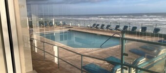 Life is better at the beach!  Stunning, oceanfront, corner-unit condominium.