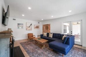 Smart TV, fireplace, DVD player, books