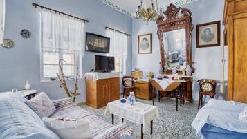 Traditional House, Sea View, Beachfront | Living area | 47-inch flat-screen TV with digital channels