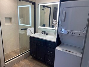 Hair dryer, towels, soap, toilet paper