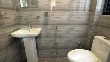 Hair dryer, towels, soap, shampoo