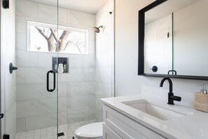 Shower, hair dryer, towels, soap