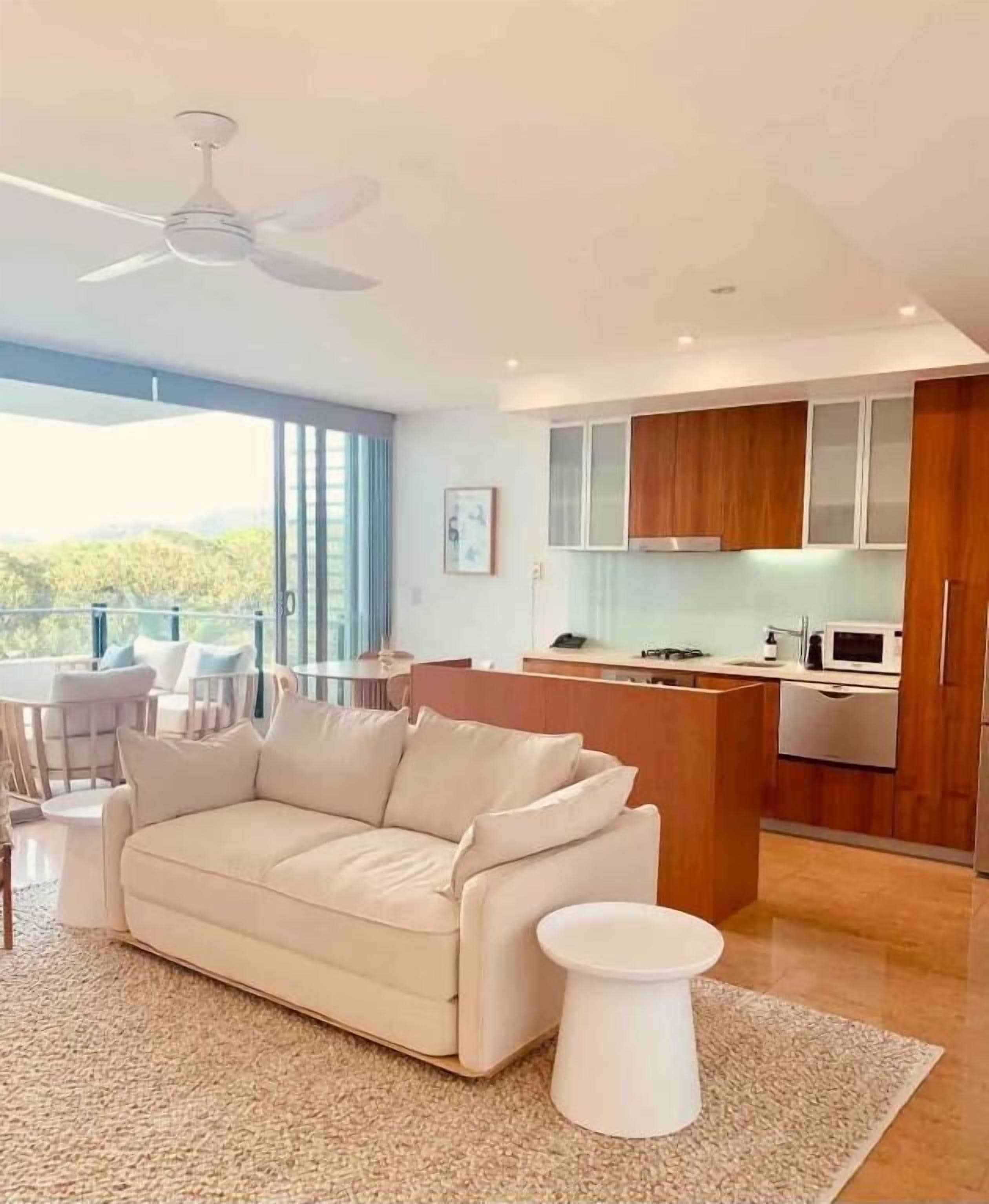 Superior Apartment | Living area | Flat-screen TV