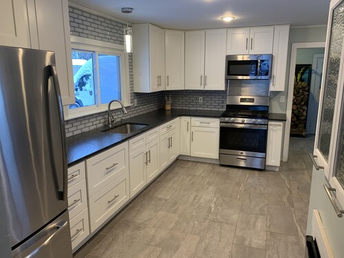 Welcome to Maison Bleu…just 200 steps away from the waters edge of Burt Lake!