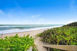 On the beach, sun-loungers, beach towels