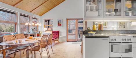 Fridge, stovetop, dishwasher, coffee/tea maker