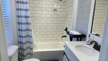 Hair dryer, towels, soap, shampoo