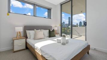 2 dormitorios, tabla de planchar con plancha, cuna de viaje y wifi