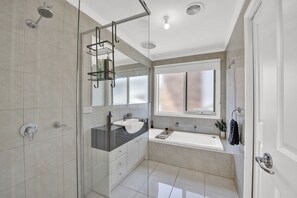 Shower, hair dryer, towels