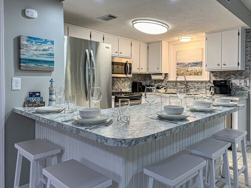 4 bedrooms, Heated pools, Street Legal Golf Cart included, Beach Community