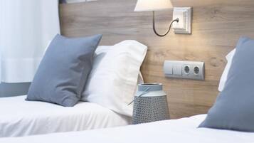 2 dormitorios, tabla de planchar con plancha, Internet y ropa de cama