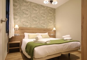 2 habitaciones, tabla de planchar con plancha, internet y ropa de cama 