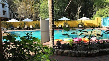 Luxury Room, Pool View | 1 bedroom, minibar, in-room safe, desk