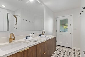 Hair dryer, towels, shampoo