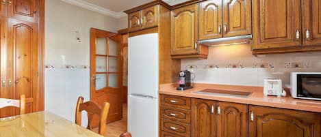 Fridge, microwave, dishwasher, coffee/tea maker
