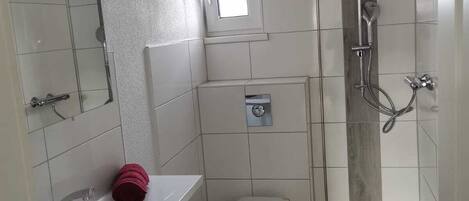 Hair dryer, towels, soap, toilet paper