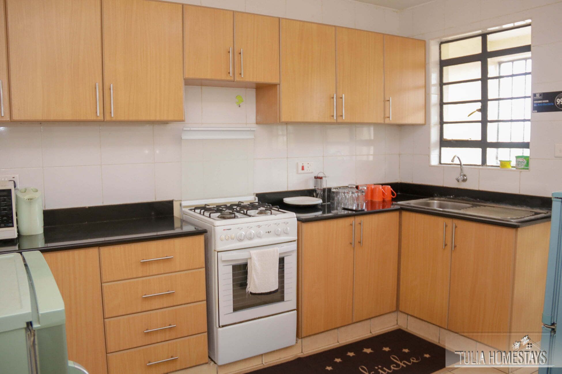 Apartamento empresarial | Cozinha privada | Geladeira, micro-ondas, fogão, talheres/pratos/utensílios de cozinha