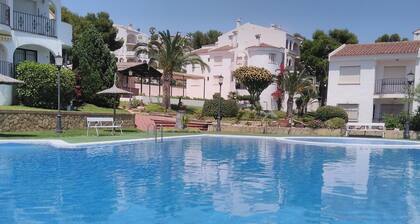 Apartment in Peniscola with pool, tennis court, and playground