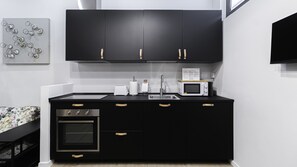 Apartment (2 Bedrooms) | Eigene Küche | Kühlschrank, Mikrowelle, Ofen, Herdplatte