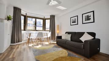 Superior Apartment | Living area | 42-inch LED TV with digital channels, streaming services