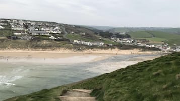 Stroll down to the beach along the scenic pathway, taking in the tranquil views of the sea.