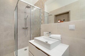Shower, hair dryer, shampoo