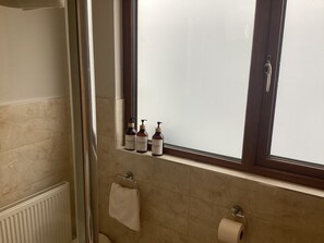Shower, hair dryer, towels, soap