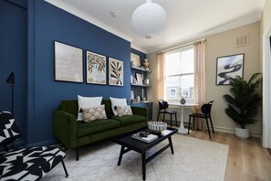 Apartment (1 Bedroom) | Living area | TV