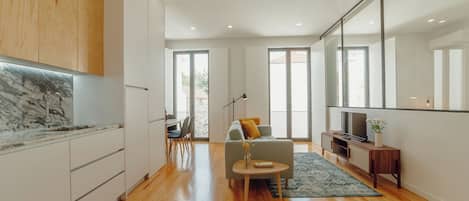 Family Apartment | Living area | 32-inch flat-screen TV with cable channels