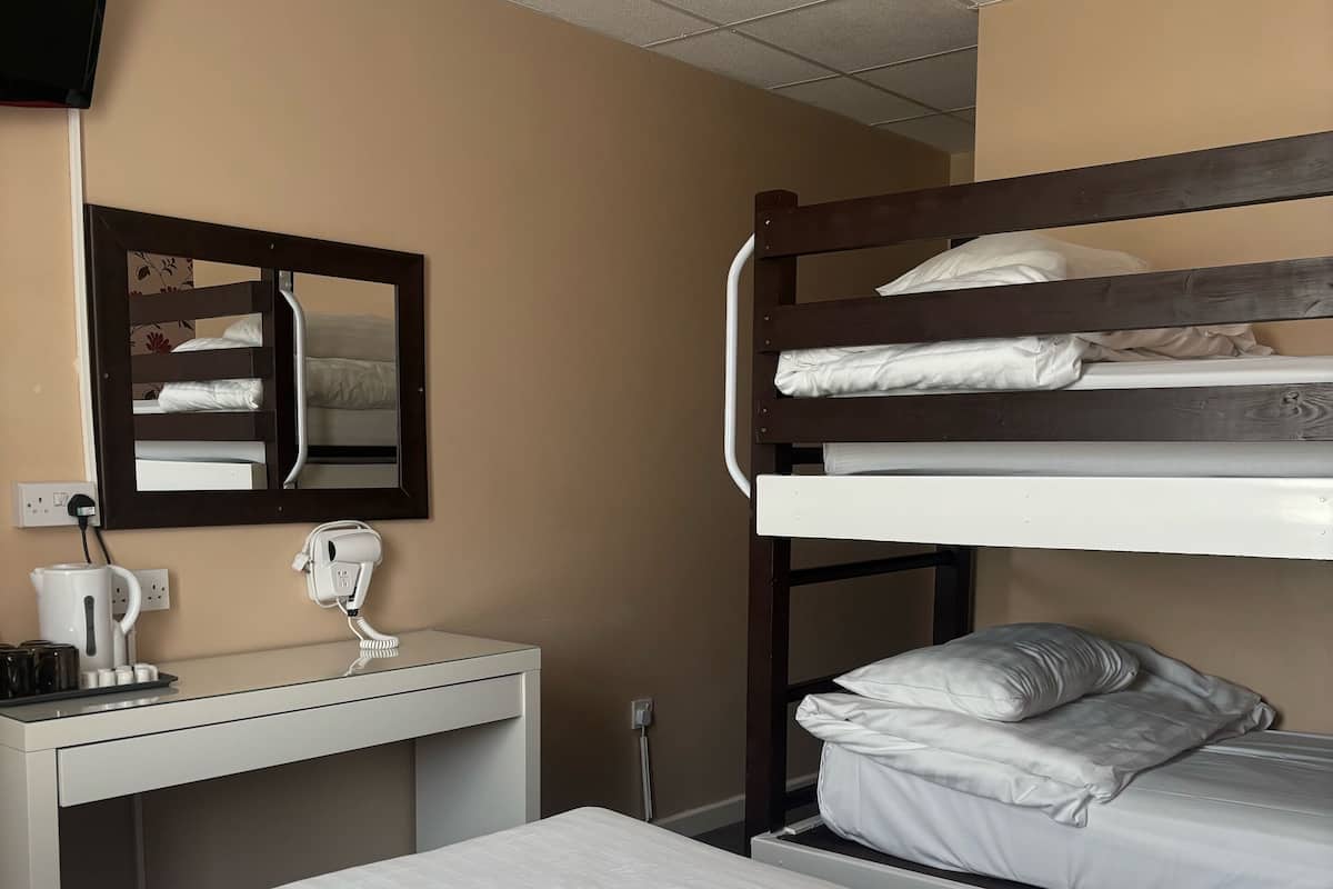 Family Quadruple Room | Laptop workspace, iron/ironing board (on request), WiFi (free)