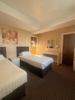 Economy Twin Room | Laptop workspace, iron/ironing board, free WiFi, bed sheets