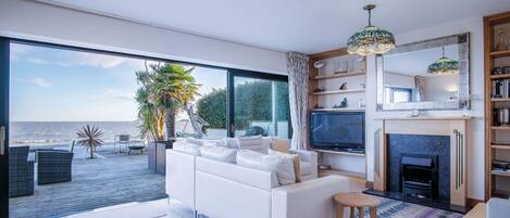 32-inch TV with cable channels, fireplace